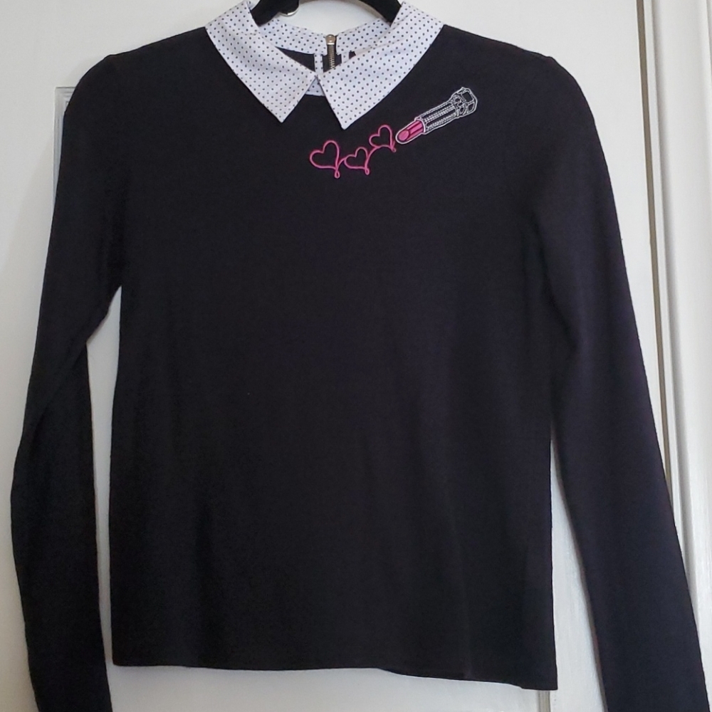 Black top with polka dot collar